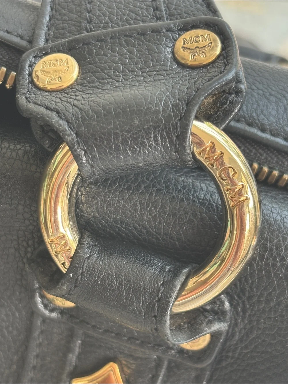 MCM Black Leather Satchel with Gold Hardware Accents